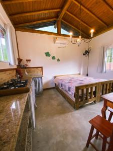 Kuchyň nebo kuchyňský kout v ubytování Flat aconchegante próximo à Trindade e Paraty