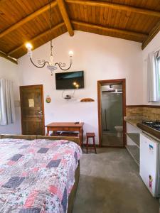 Postel nebo postele na pokoji v ubytování Flat aconchegante próximo à Trindade e Paraty