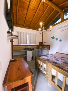 Kuchyň nebo kuchyňský kout v ubytování Flat aconchegante próximo à Trindade e Paraty