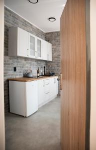 Kuchyň nebo kuchyňský kout v ubytování Apartmány Goliáš