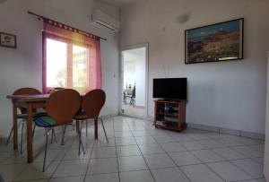 TV a/nebo společenská místnost v ubytování Apartmani Ruk
