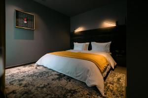Postel nebo postele na pokoji v ubytování Mert Boutique Hotel
