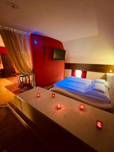 Postel nebo postele na pokoji v ubytování Spa & Wellness Hotel Orchidea