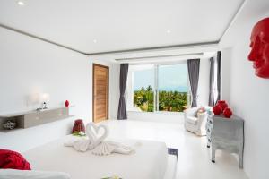 Ένα ή περισσότερα κρεβάτια σε δωμάτιο στο Villa SAYAM, vue mer panoramique & piscine infinity privée à Bophut +13 φωτογραφίες