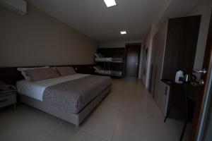 a bedroom with a large bed in a room at B&B” La Tezza” in Torre De' Roveri +3 photos