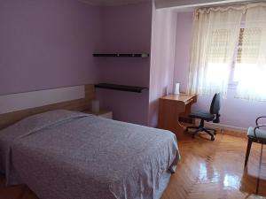 Postel nebo postele na pokoji v ubytování San Julián