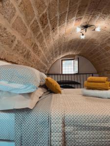 Postel nebo postele na pokoji v ubytování Suite San Pietro