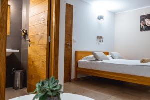 Postel nebo postele na pokoji v ubytování Guest House PachaMama