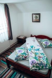Säng eller sängar i ett rum på Casa Ianis