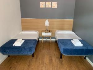 Posteľ alebo postele v izbe v ubytovaní Paraiso Hostel