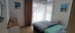 Posteľ alebo postele v izbe v ubytovaní Mazurski relax plus Taras Garaż podziemny