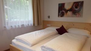Posteľ alebo postele v izbe v ubytovaní Residence Klementhof 2
