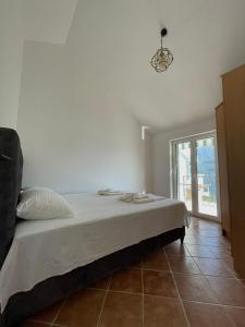 Кровать или кровати в номере Villa WERONA Njivice