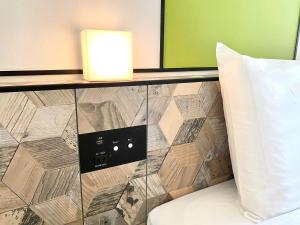 Katil atau katil-katil dalam bilik di Henn na Hotel Osaka Shinsaibashi