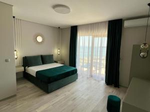 Katil atau katil-katil dalam bilik di Apartments GC 1