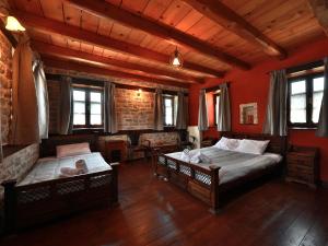 Ένα ή περισσότερα κρεβάτια σε δωμάτιο στο Agriogido - Rupicapra Villas