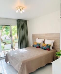 Postel nebo postele na pokoji v ubytování Superbe Studio Ultra COSY à 2 min de la PLAGE