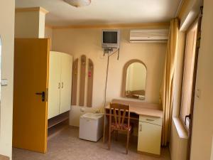 TV a/nebo společenská místnost v ubytování Hotel Apart
