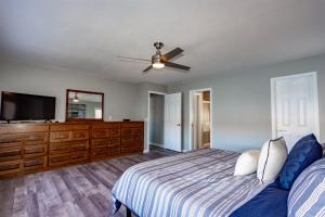 a bedroom with a bed and a flat screen tv at 18906 - 6 Zapato Circle in Hot Springs