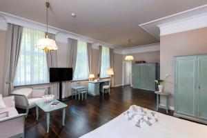 Precise Resort Rügen Apartments & SPLASH Erlebniswelt客房内的一张或多张床位