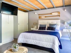 Posteľ alebo postele v izbe v ubytovaní OleHolidays 406 Loft Romana Playa junto al mar