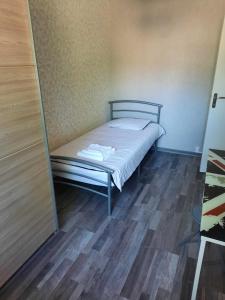 Posteľ alebo postele v izbe v ubytovaní tres bel appartement et situation au top