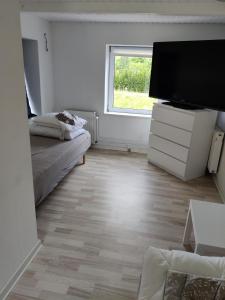 Letto o letti in una camera di 210 m2 hus til 8 gæster - 5 km fra nyt stort vandland