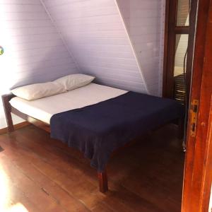 Krevet ili kreveti u jedinici u okviru objekta Chalé Dona Jandira
