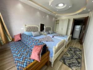 A bed or beds in a room at Amazing Sea View 2 bedroom apartment