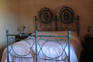 Postel nebo postele na pokoji v ubytování Agriturismo Portoreschi