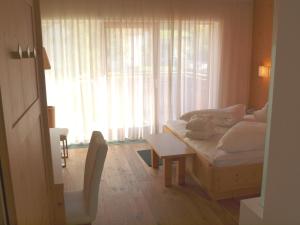 Postel nebo postele na pokoji v ubytování Sporthotel Rasen + 37 fotografií