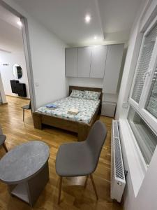 Krevet ili kreveti u jedinici u okviru objekta S-LUX Apartments 1 Jagodina