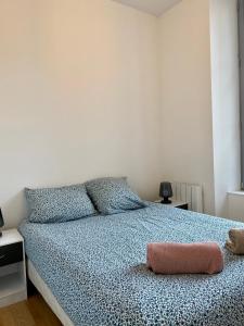 Łóżko lub łóżka w pokoju w obiekcie Villa des Thermes - T3