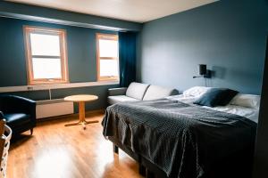 Postel nebo postele na pokoji v ubytování Canyon Hotell