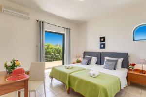 Posteľ alebo postele v izbe v ubytovaní Villa Anni by Villa Plus + 11 fotografií