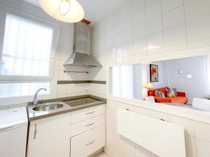 Kuchyňa alebo kuchynka v ubytovaní San Marcos Apartamentos