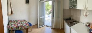 Kuchyň nebo kuchyňský kout v ubytování Adria MN Apartment