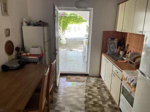 Kuchyň nebo kuchyňský kout v ubytování Adria MN Apartment