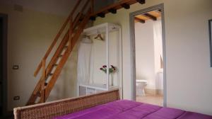 Postel nebo postele na pokoji v ubytování Agriturismo Portoreschi