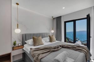 Posteľ alebo postele v izbe v ubytovaní Villa Plenus Smilje + 36 fotografií