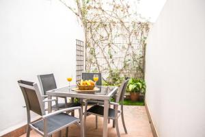 Posedenie v ubytovaní San Marcos Apartamentos