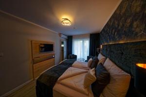 Postel nebo postele na pokoji v ubytování Hotel Dea