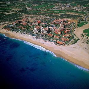 an aerial view of a resort on a beach at Suites at Hacienda Del Mar Resort Los Cabos in Cabo San Lucas