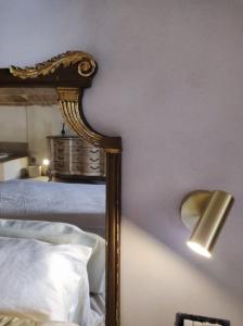 Rúm í herbergi á Brunaldi SUITE