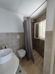Bagno di Le Bianche Suites Ostuni