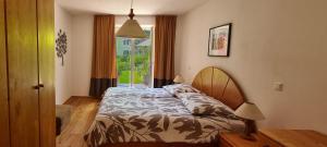 Posteľ alebo postele v izbe v ubytovaní Ferienwohnung Kuglwiese