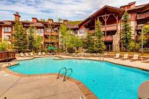 a swimming pool in front of a resort at Eagle Springs East 315: Osprey Suite in Solitude