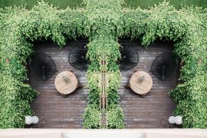 A garden outside Hotel Well and Come Barcelona
