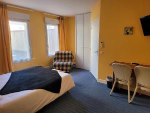 Postel nebo postele na pokoji v ubytování L'AUBERGE DE L'OLIVE