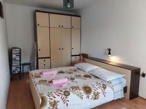 Кровать или кровати в номере APARTMAN RUŽICA